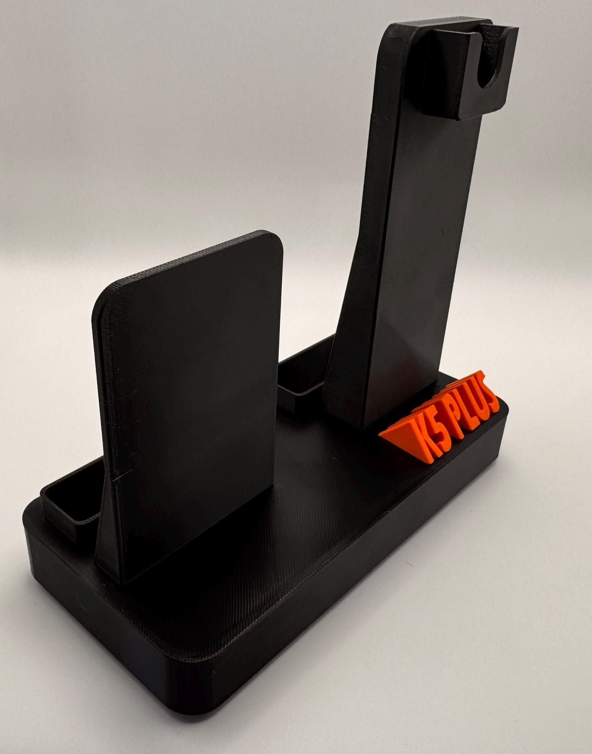 Baofeng K5 Plus desk stand with forward-facing mic – empty stand side view