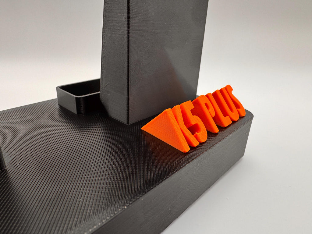 Baofeng K5 Plus desk stand with forward-facing mic – lettering close-up angled