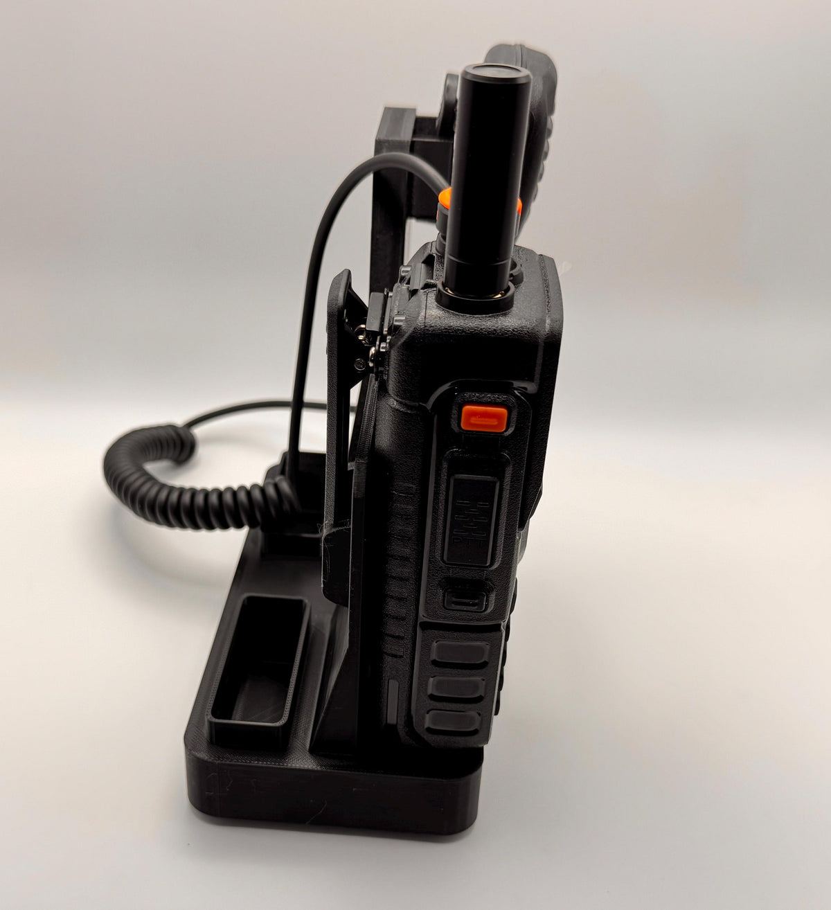 Baofeng K5 Plus desk stand with forward-facing mic – radio and batteries rear angle