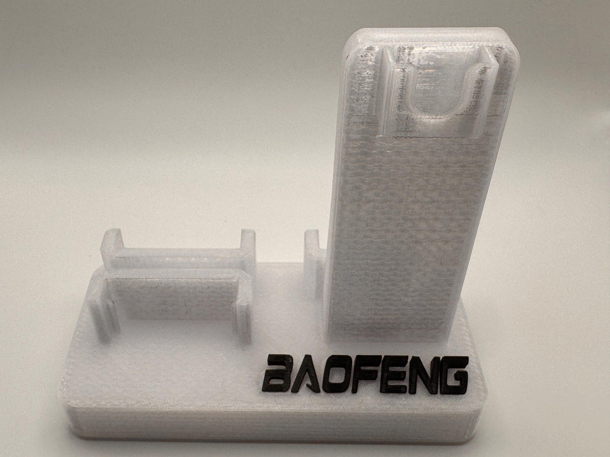 Baofeng UV-5R 25th anniversary transparent desk stand – empty stand front view
