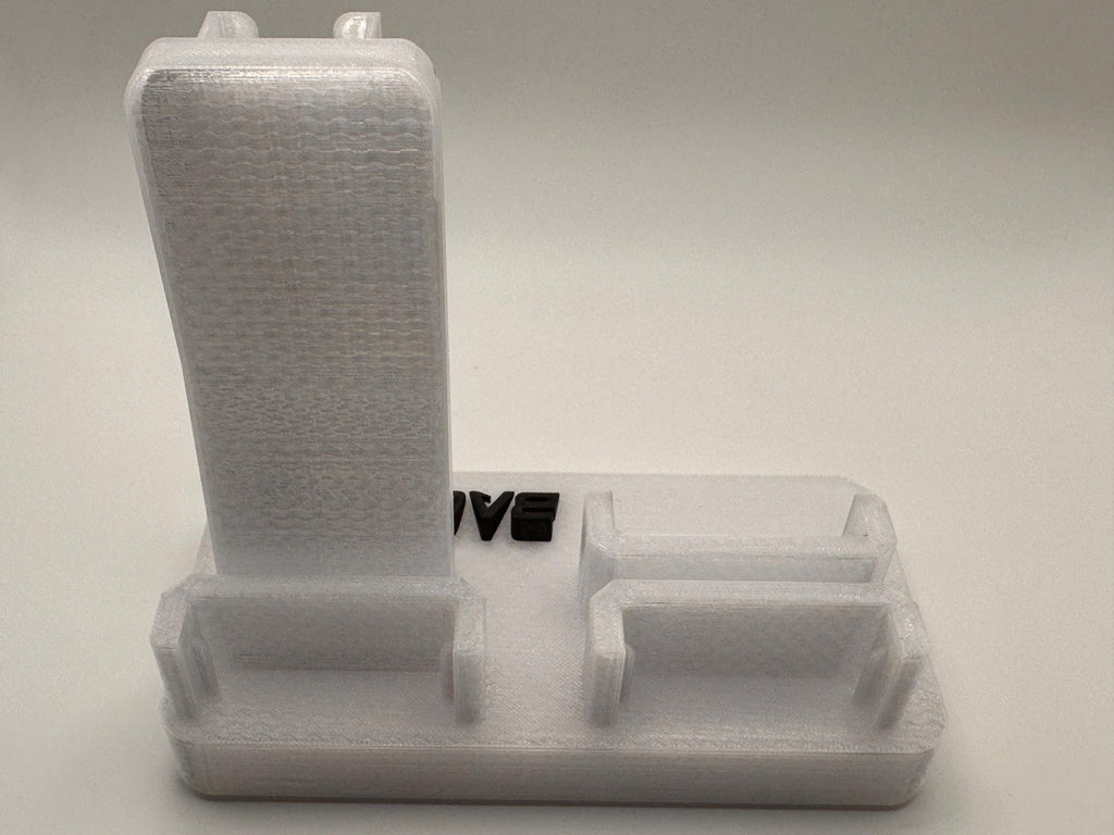 Baofeng UV-5R 25th anniversary transparent desk stand – empty stand rear view