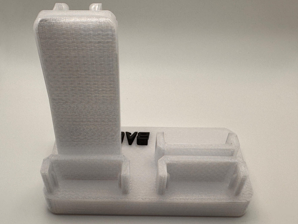 Baofeng UV-5R 25th anniversary transparent desk stand – empty stand rear view