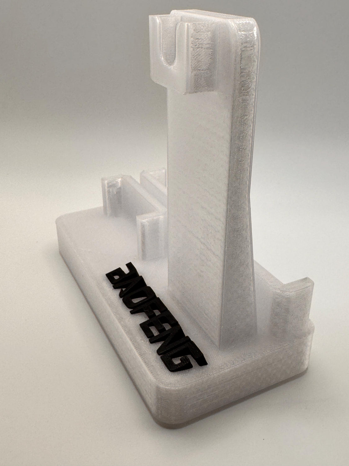 Baofeng UV-5R 25th anniversary transparent desk stand – empty stand side view