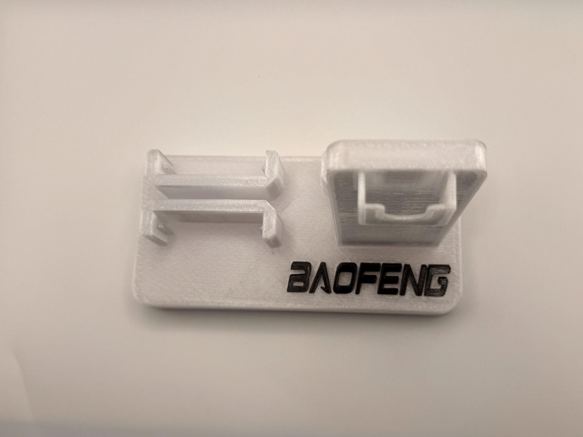 Baofeng UV-5R 25th anniversary transparent desk stand – empty stand top view