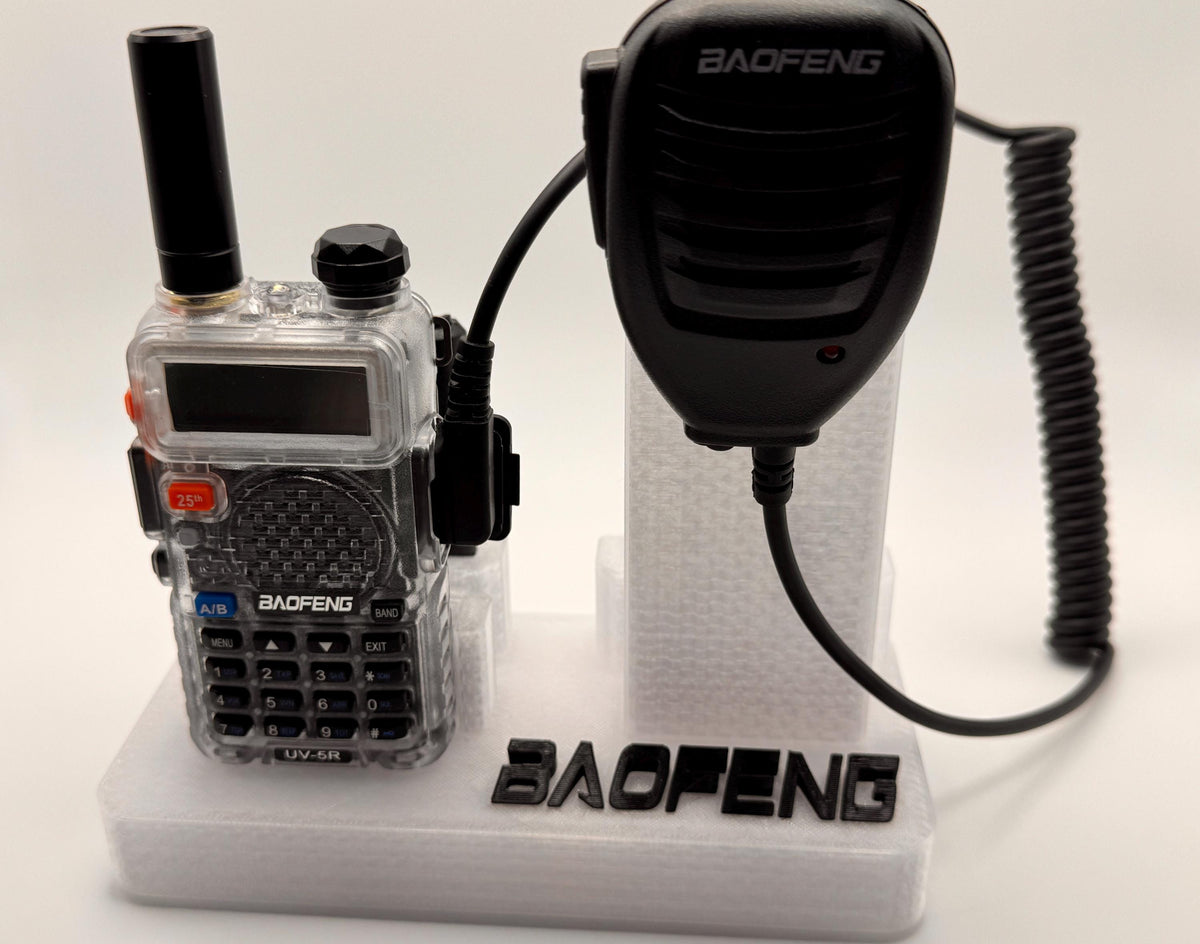 Baofeng UV-5R 25th anniversary transparent desk stand – front view with Baofeng logo