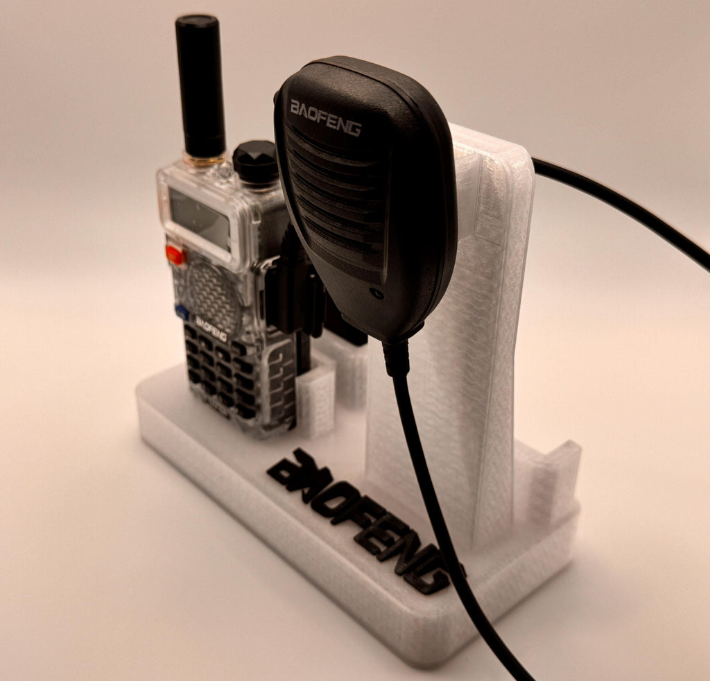 Baofeng UV-5R 25th anniversary transparent desk stand – speaker mic angled view