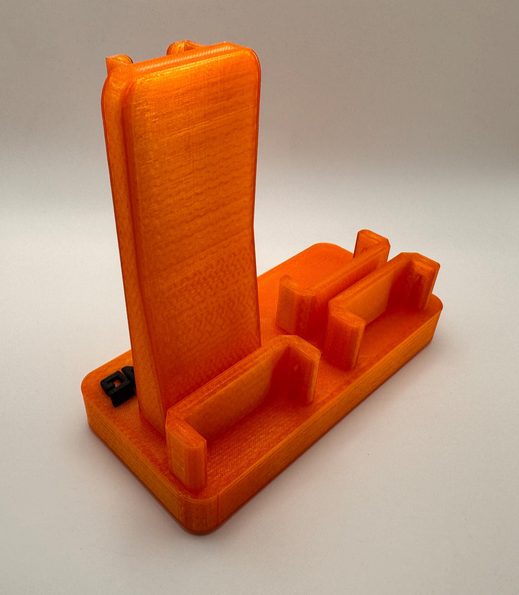 Baofeng UV-5R 25th anniversary transparent orange desk stand – mic mast angled
