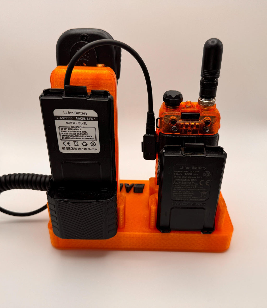 Baofeng UV-5R 25th anniversary transparent orange desk stand – radio and two spare batteries