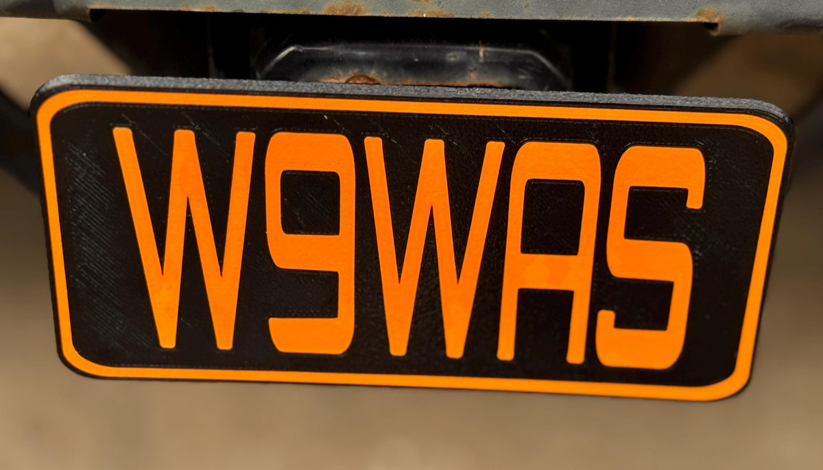 Custom Callsign Trailer Hitch Cover – orange callsign close up