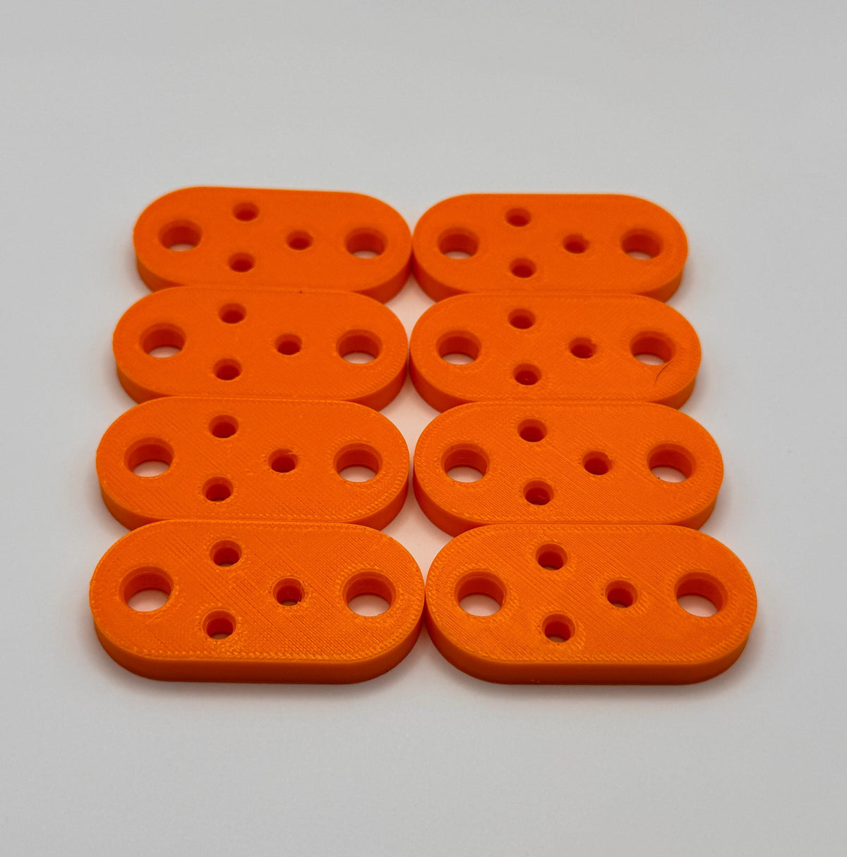 Flat 5-Hole Antenna Wire Insulators – 8-pack in orange