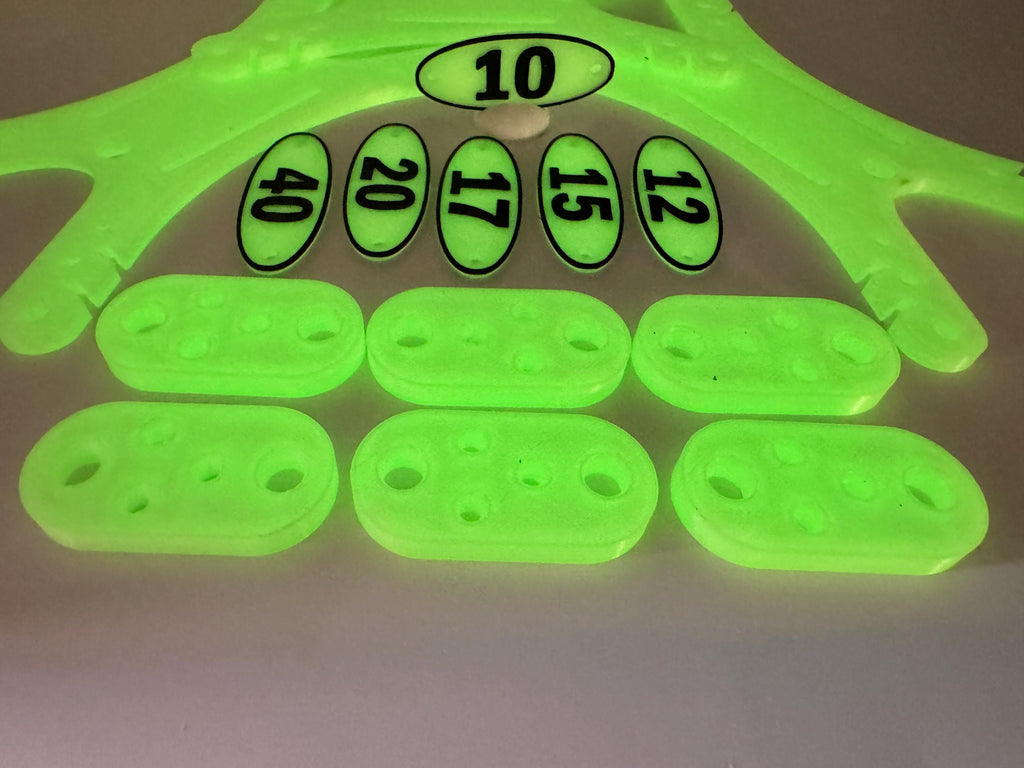 Glow-in-the-Dark Portable Antenna Kit – band markers and insulators glowing, close-up