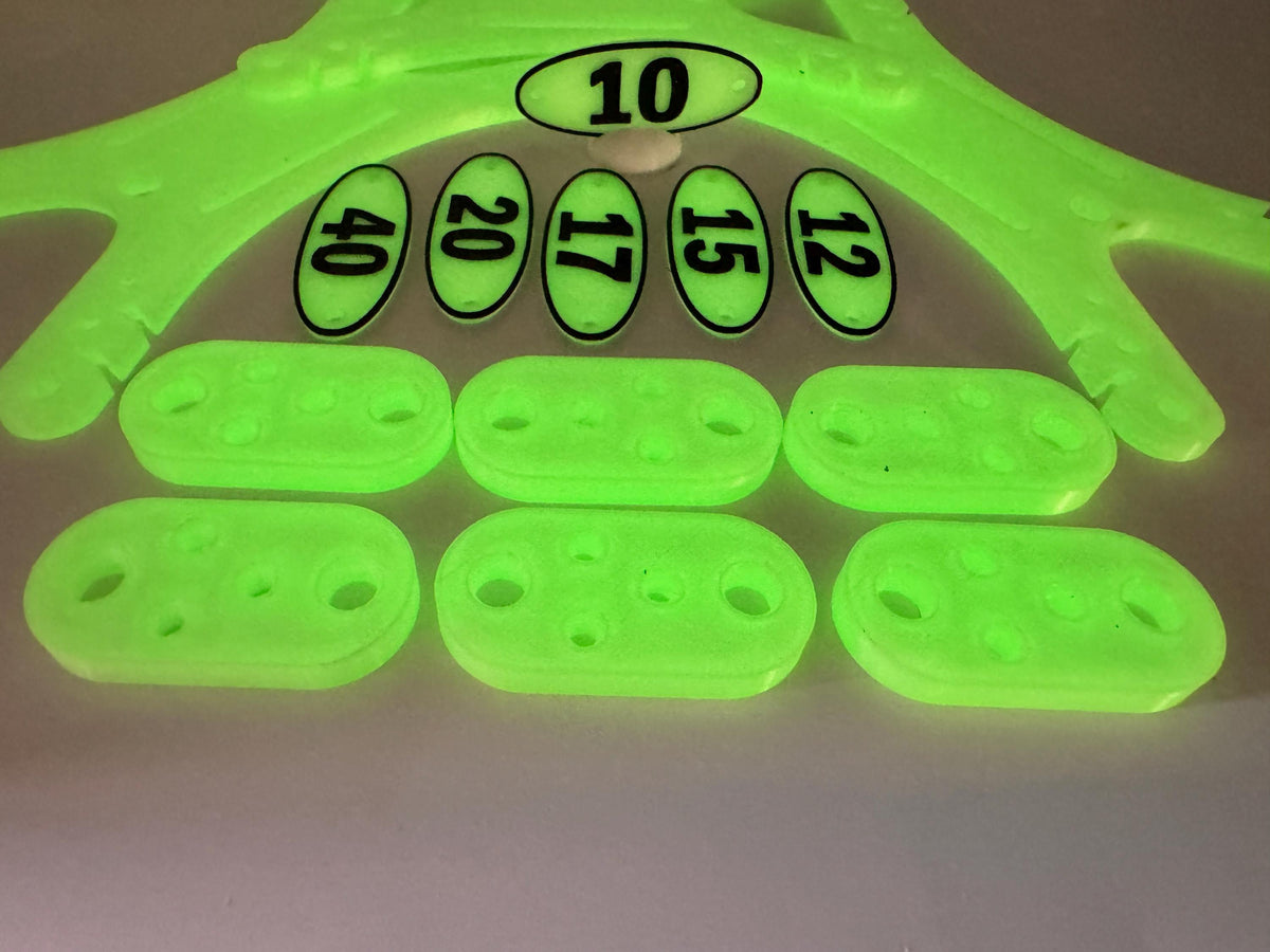 Glow-in-the-Dark Portable Antenna Kit – band markers and insulators glowing, close-up