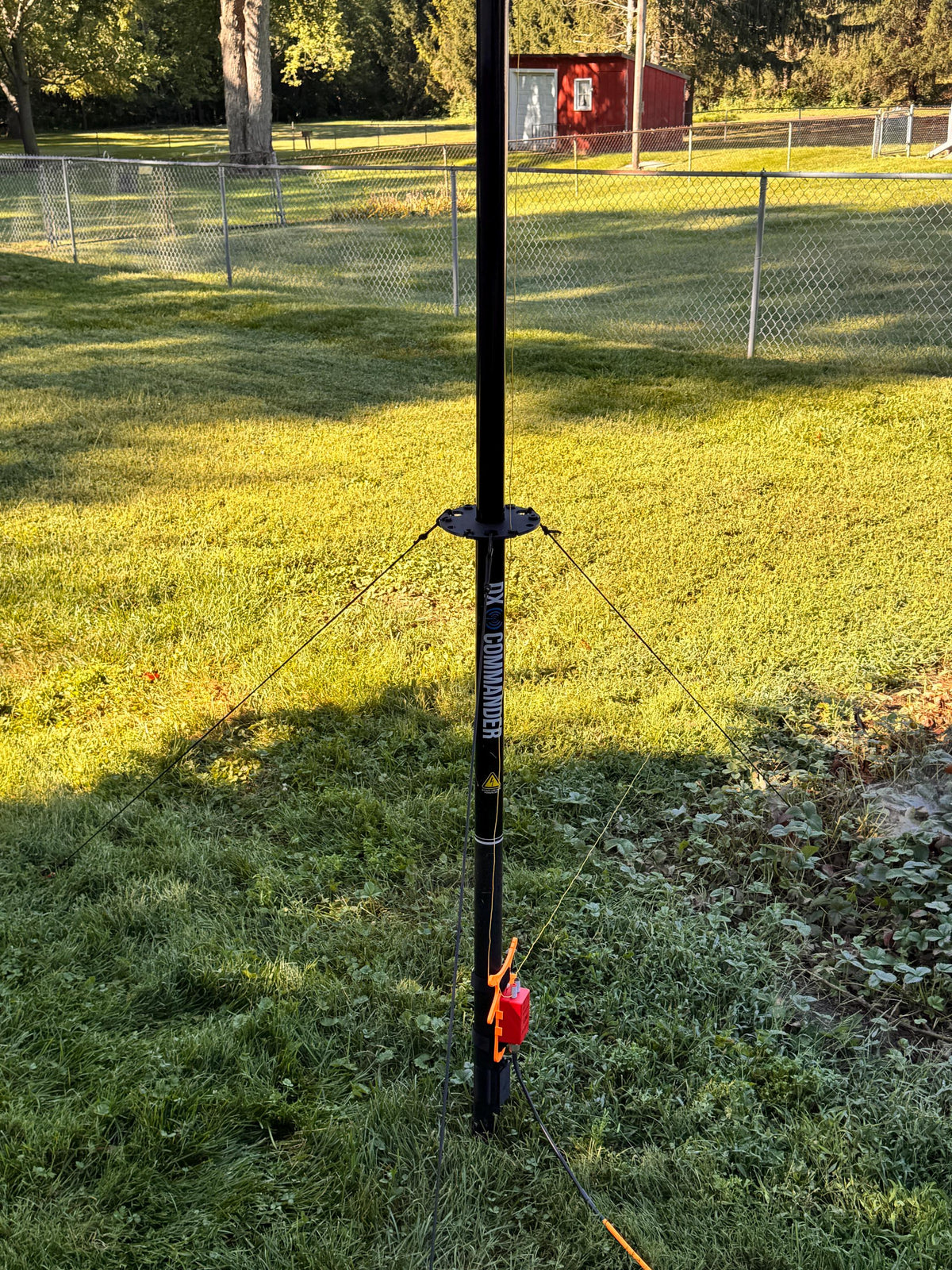 LDG balun/unun wire winder mount – deployed on mast in yard