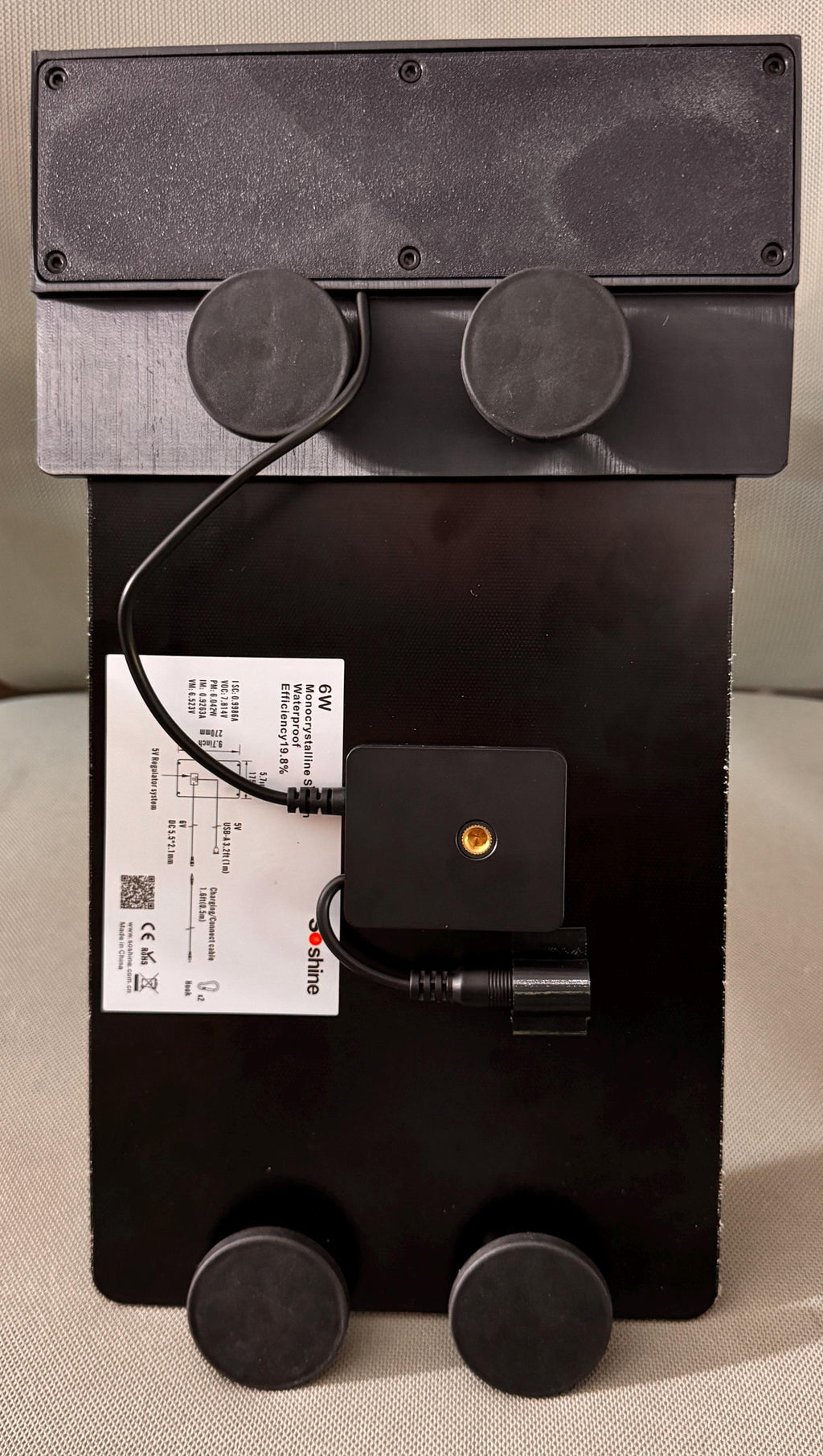 Meshtastic solar node housing – back view with magnets and solar panel wiring