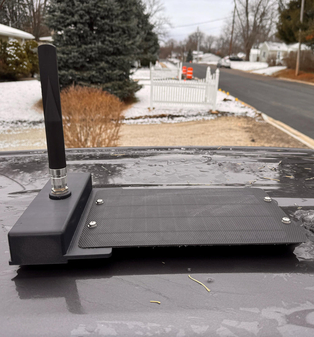 Meshtastic solar node housing – mounted outdoors on a vehicle roof