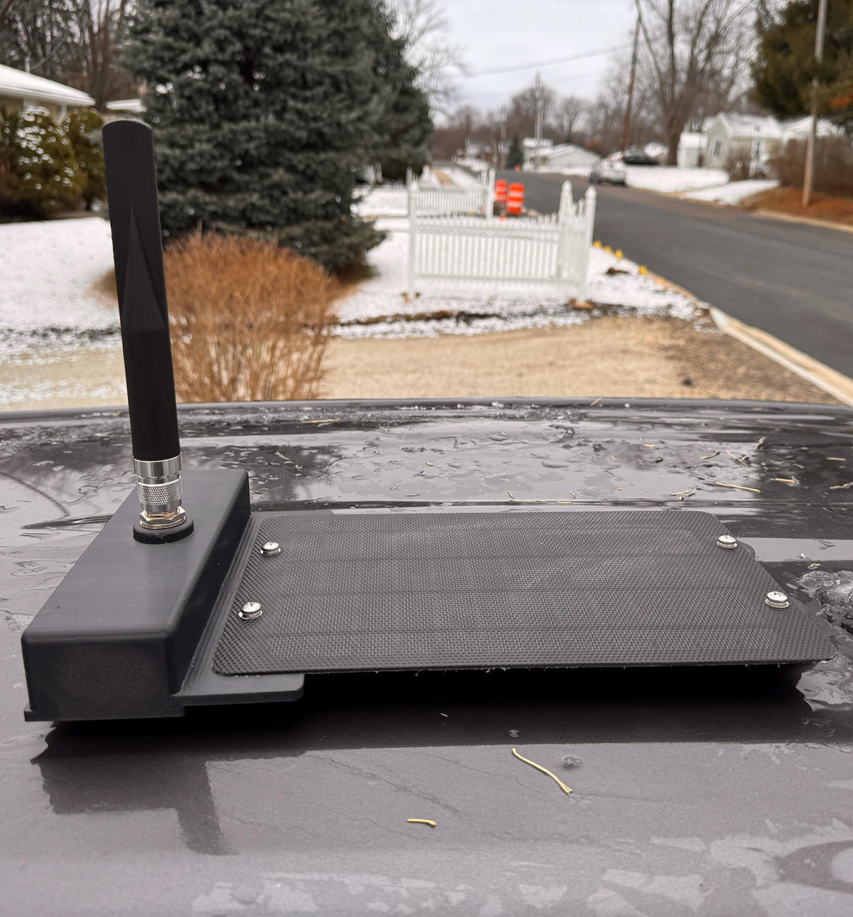 Meshtastic solar node housing – mounted outdoors on a vehicle roof