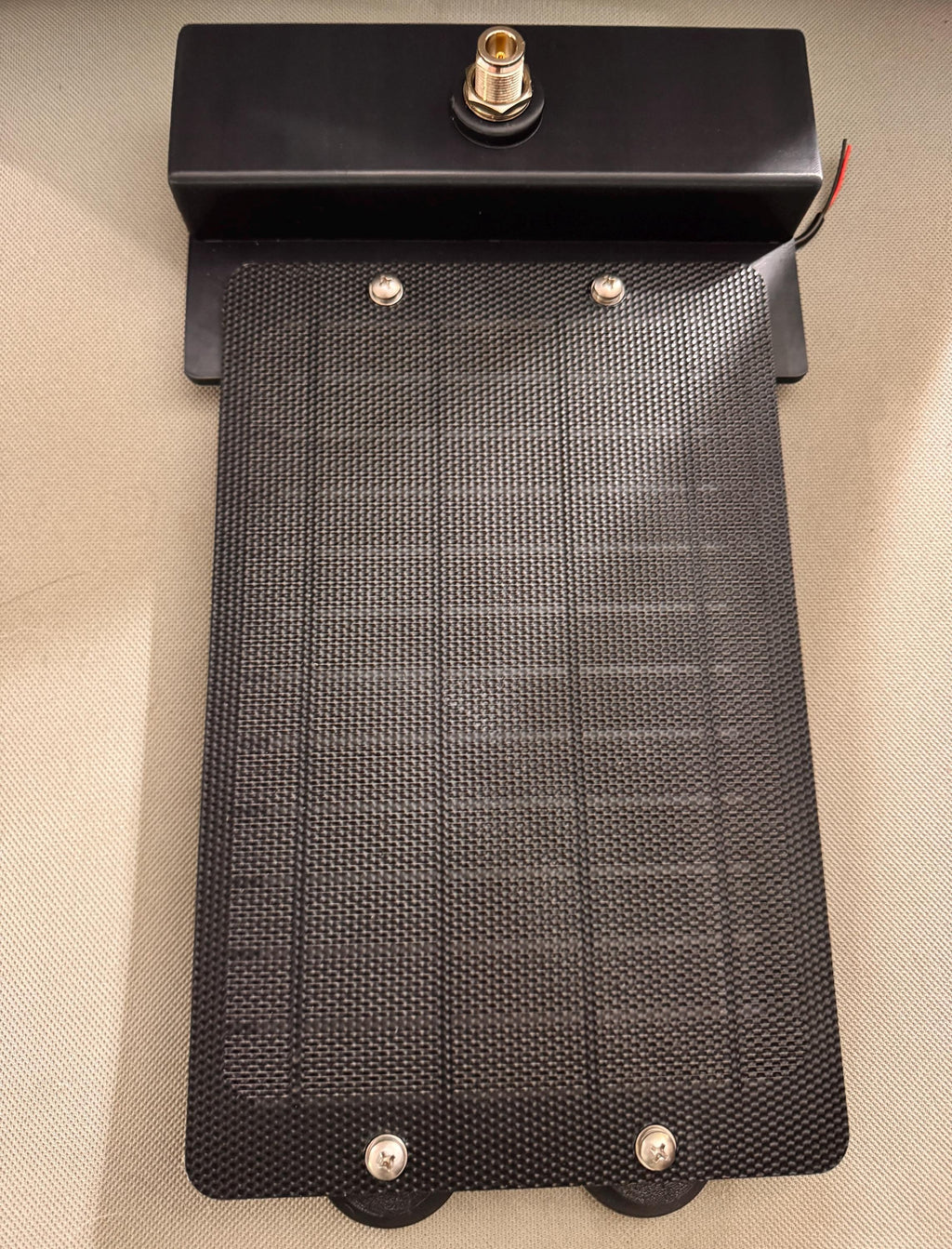 Meshtastic solar node housing – top view with solar panel mounted