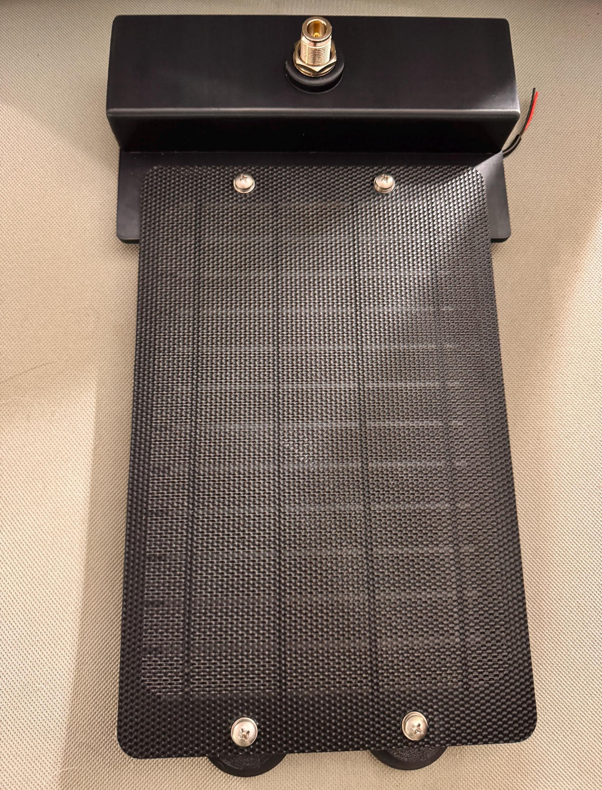 Meshtastic solar node housing – top view with solar panel mounted