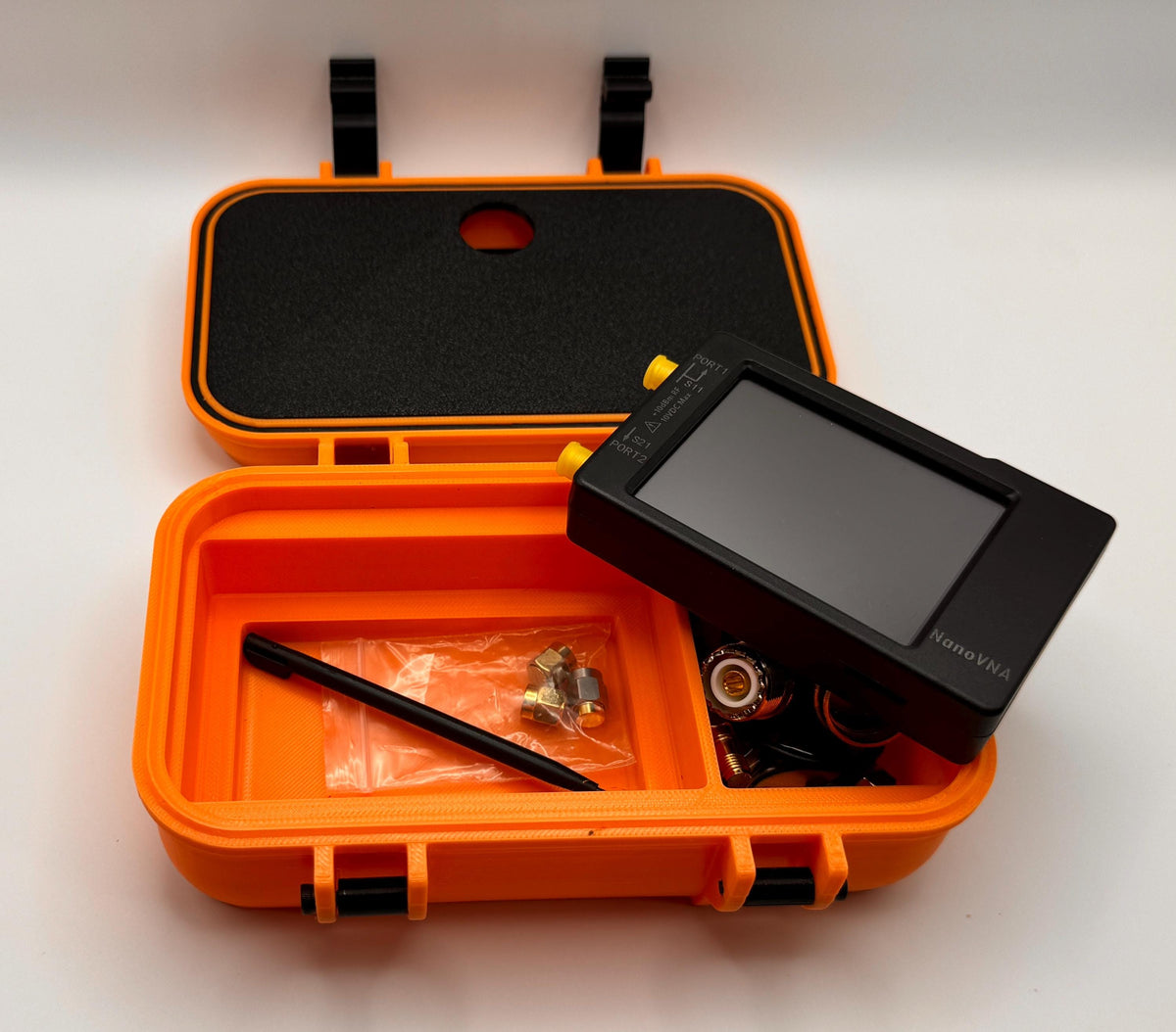 NanoVNA-H 2.8" protective case – NanoVNA on stand beside case