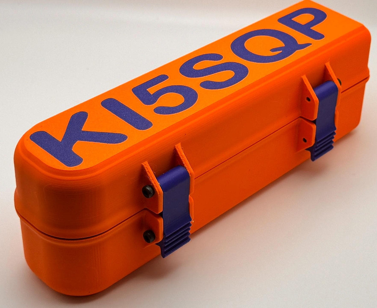 RigExpert Stick hinged protective case – orange case with blue callsign