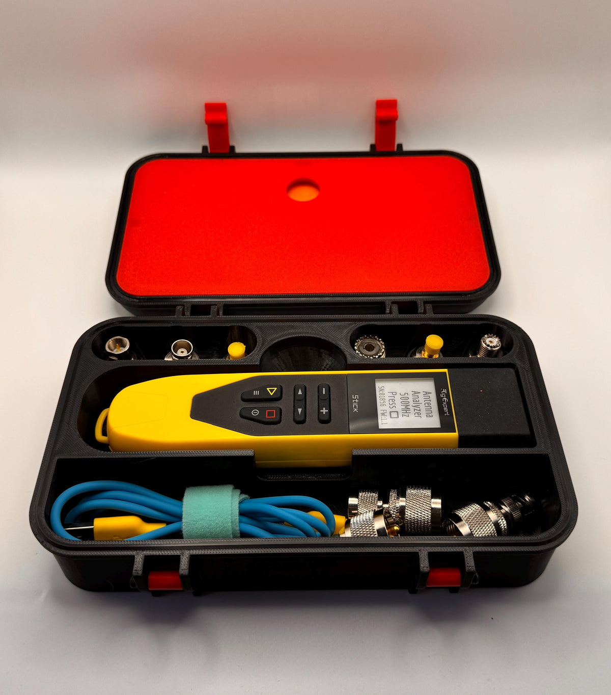 RigExpert Stick large storage case – open with analyzer and cables