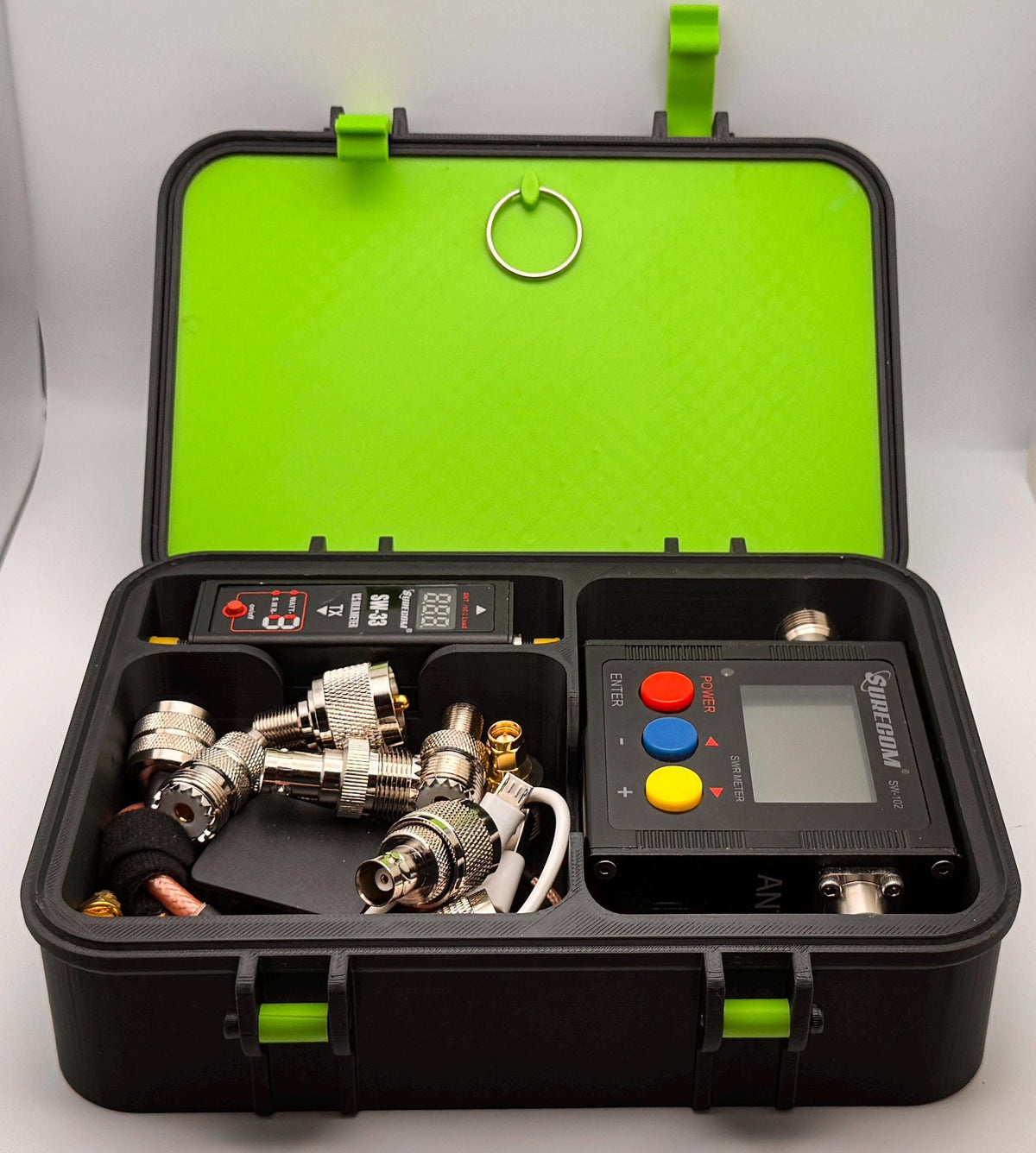 Surecom SW-102 / SW-33 SWR meter case – open with SWR meter and adapters