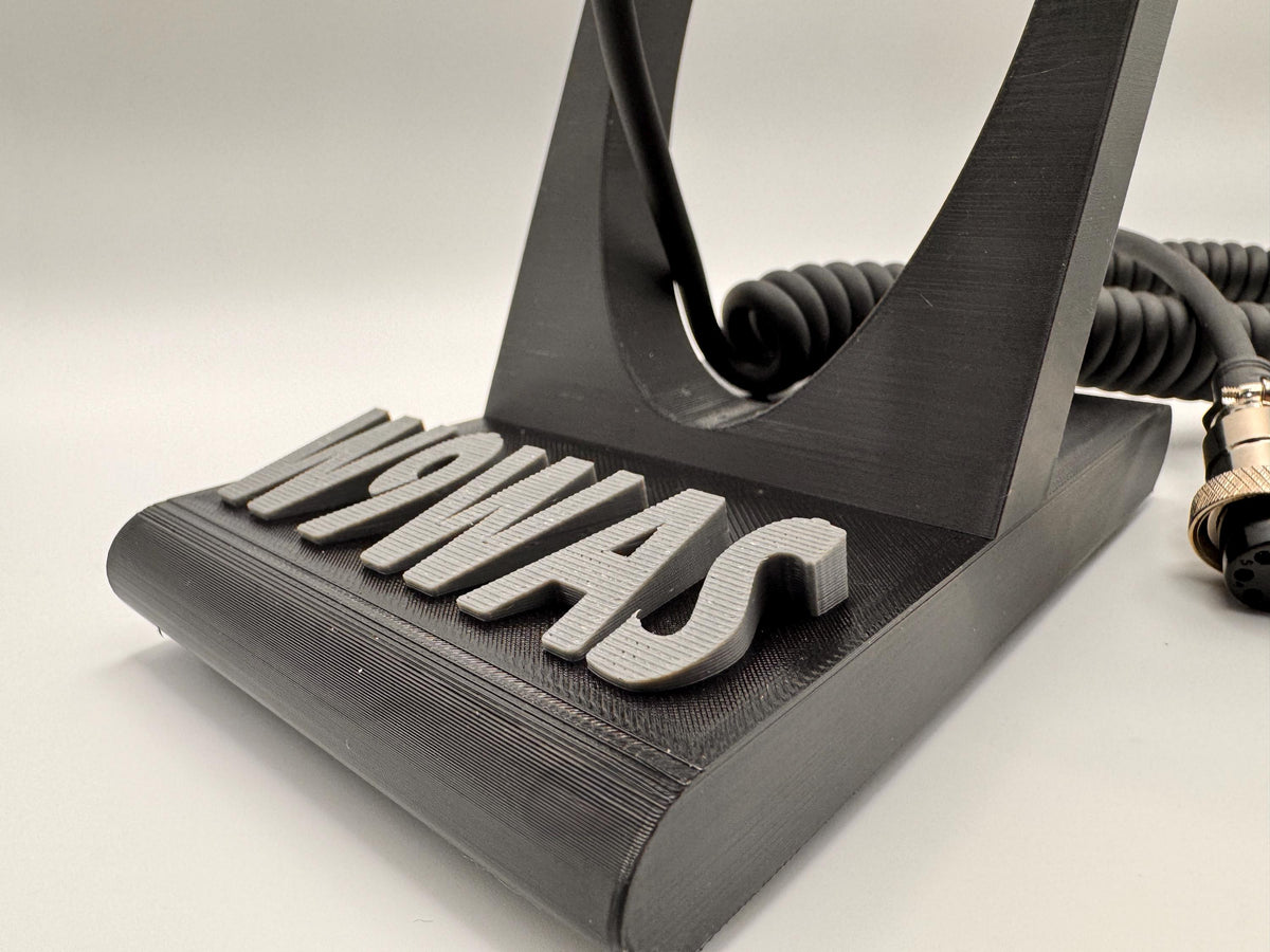 Universal radio hand microphone stand – angled callsign close-up