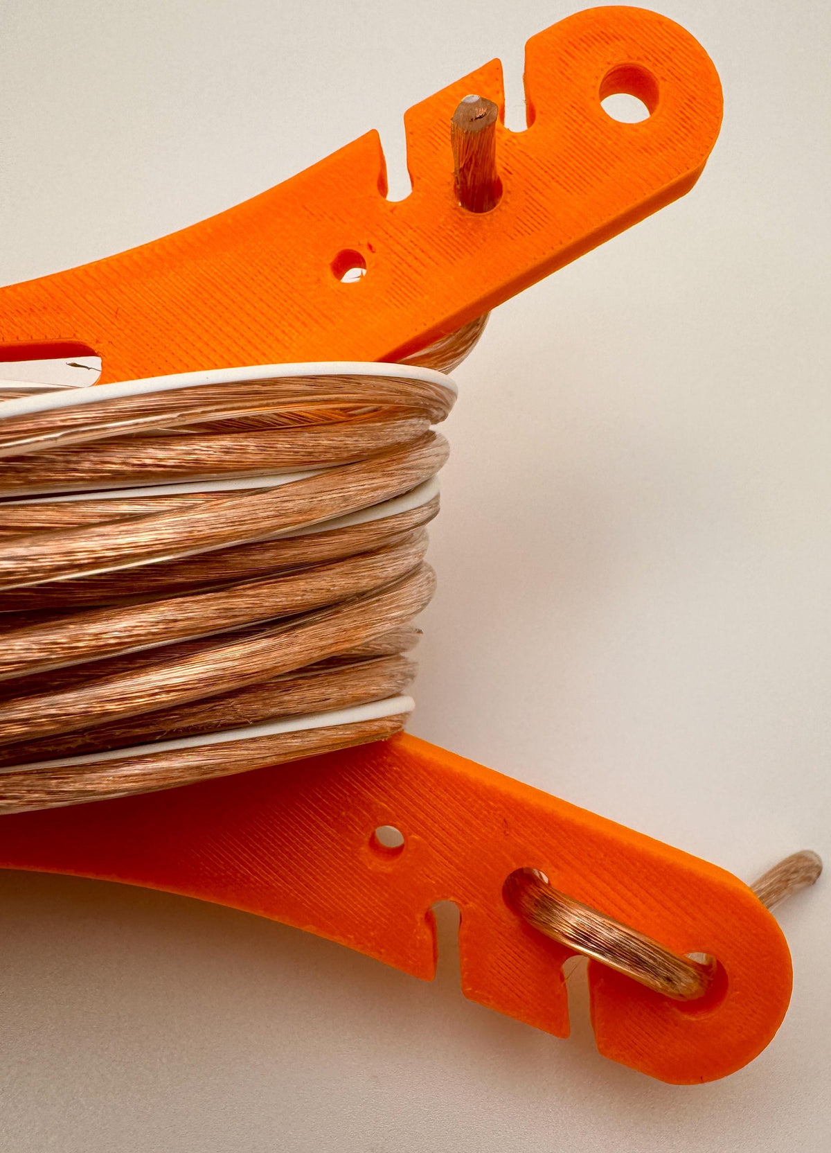 Universal antenna wire and paracord winder 3-pack – wire wound side view