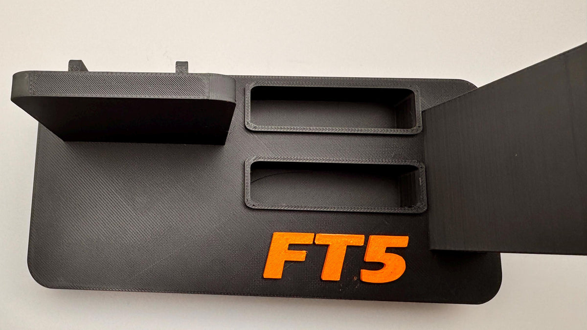 Yaesu FT5D desk stand with FT5 motif – FT5 motif close-up